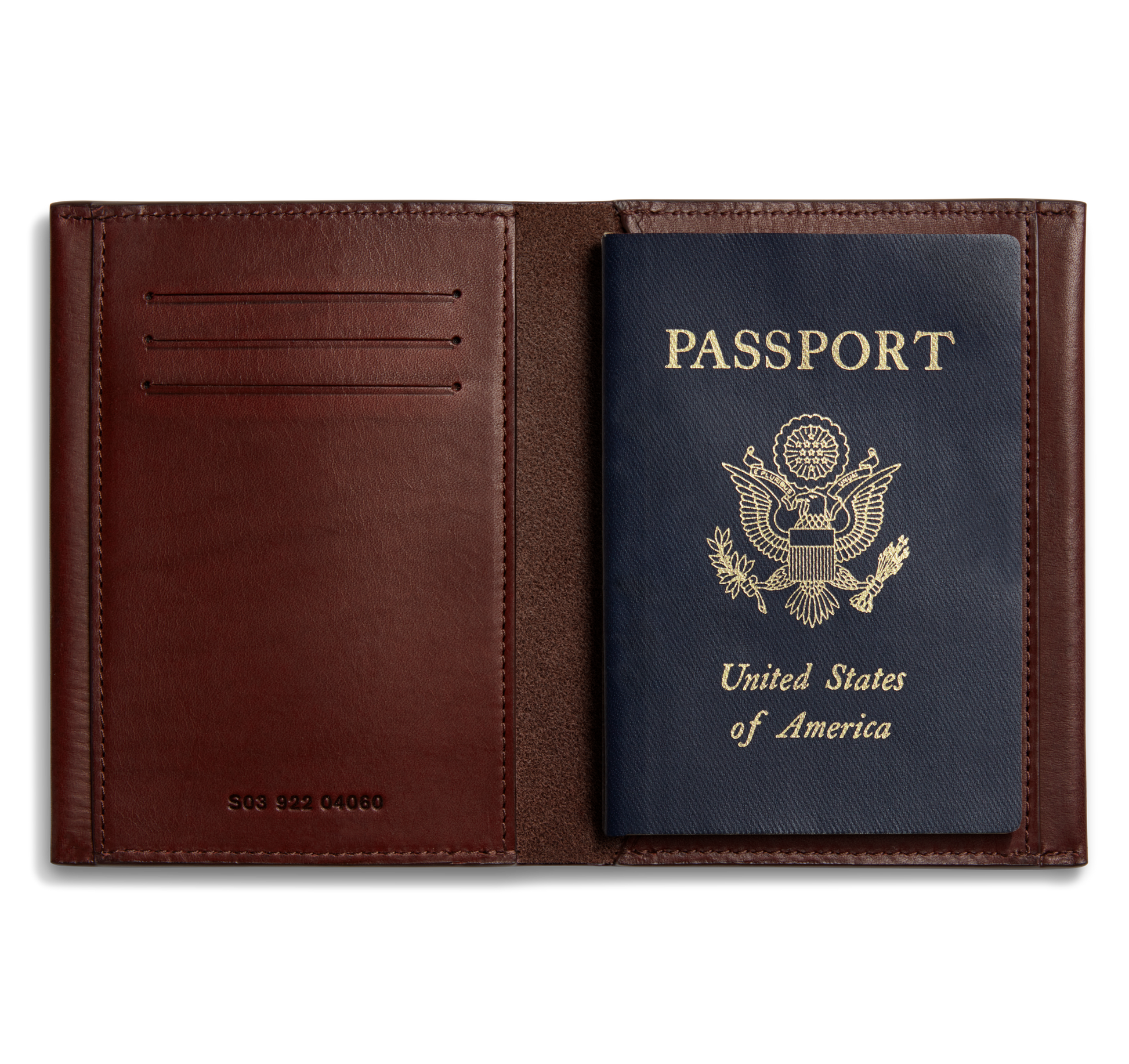 The Shinola Passport Holder - Merlot is open, displaying a blue U.S. passport inside. This refined accessory offers three card slots on the left and embossed numbers at the lower left corner, crafted in dark brown Italian Vachetta leather.