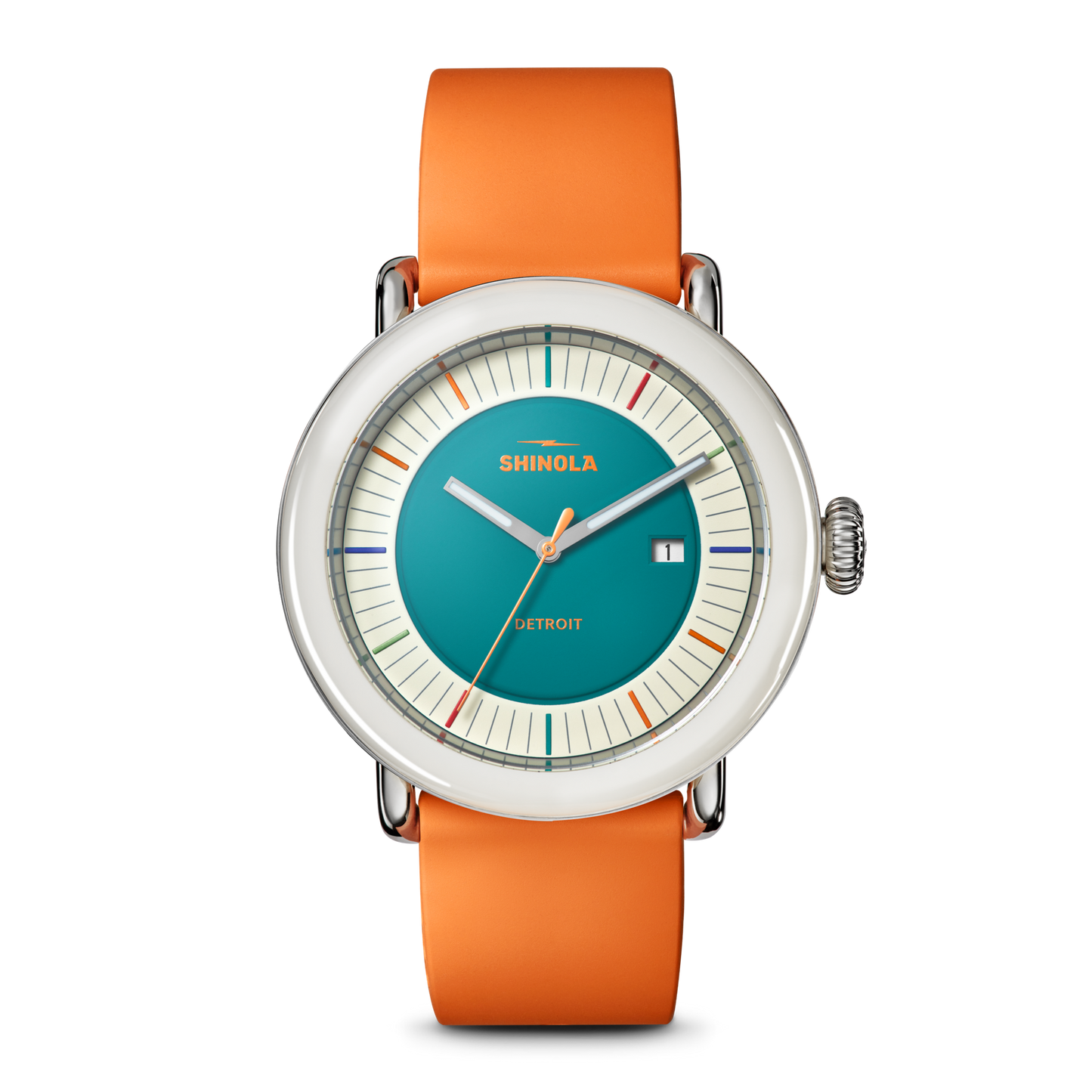 The Detrola Watch - Aqua Green by Shinola features an art-inspired design with an orange band, silver case, teal face, colorful hour markers, and a small date window on the right for a bold modern statement.