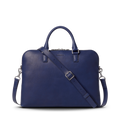The Shinola Portfolio Briefcase - Lake is a stylish, dark blue slim laptop bag made from European grain leather, featuring a detachable shoulder strap, top handles, and silver hardware, set against a plain white background.