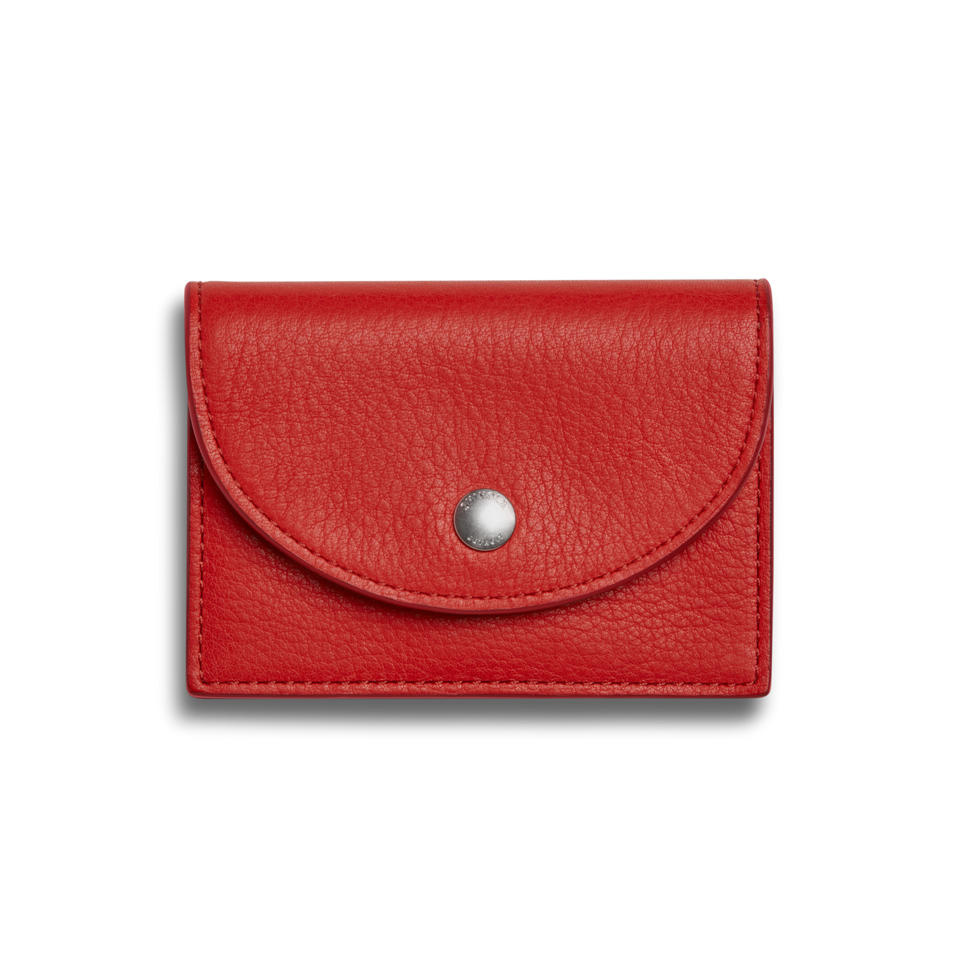 The Shinola Birdy Accordion Card Holder - Tomato, a compact red natural leather wallet with a curved flap, silver snap closure, and card pockets, is shown against a plain light background.
