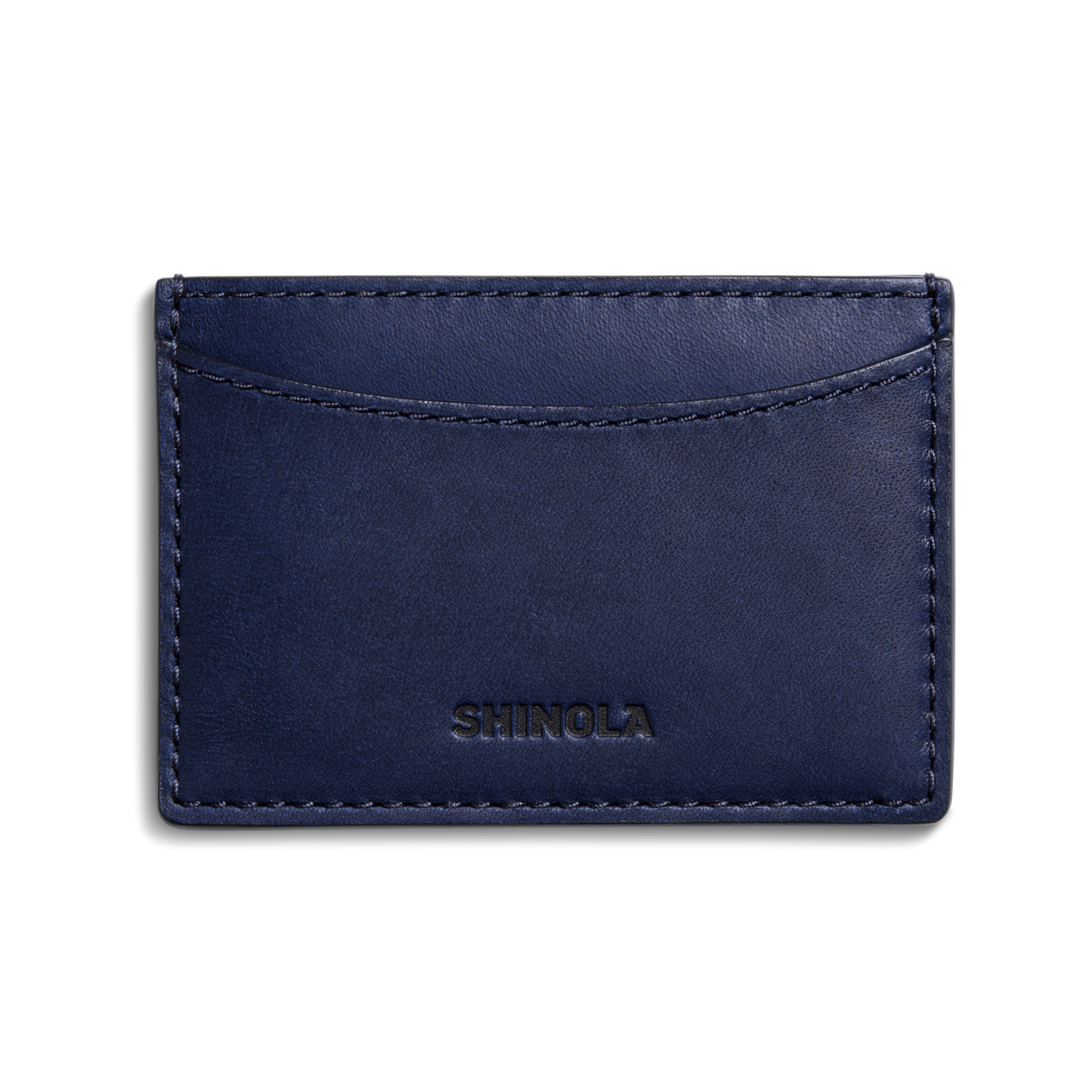 A navy blue Leather 3 Pocket Card Case - Lake by Shinola, featuring a curved top slot and the brand name embossed on the front, photographed against a white background.