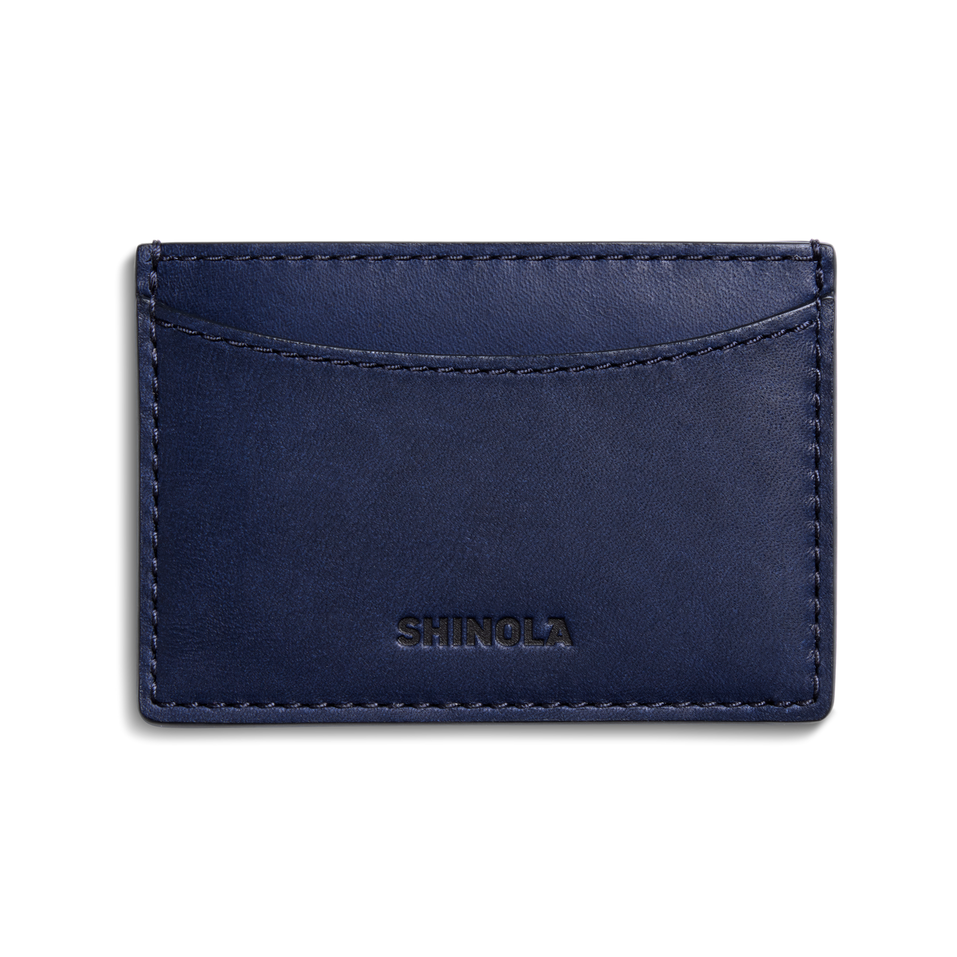A navy blue Leather 3 Pocket Card Case - Lake by Shinola, featuring a curved top slot and the brand name embossed on the front, photographed against a white background.