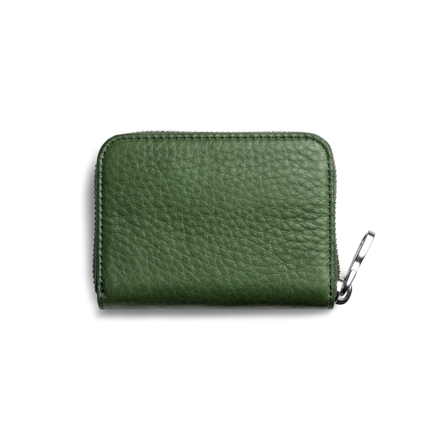 The Shinola Pocket Small Zip Around Wallet in Evergreen features textured green grain leather and a zip-around closure, displayed on a plain white background.