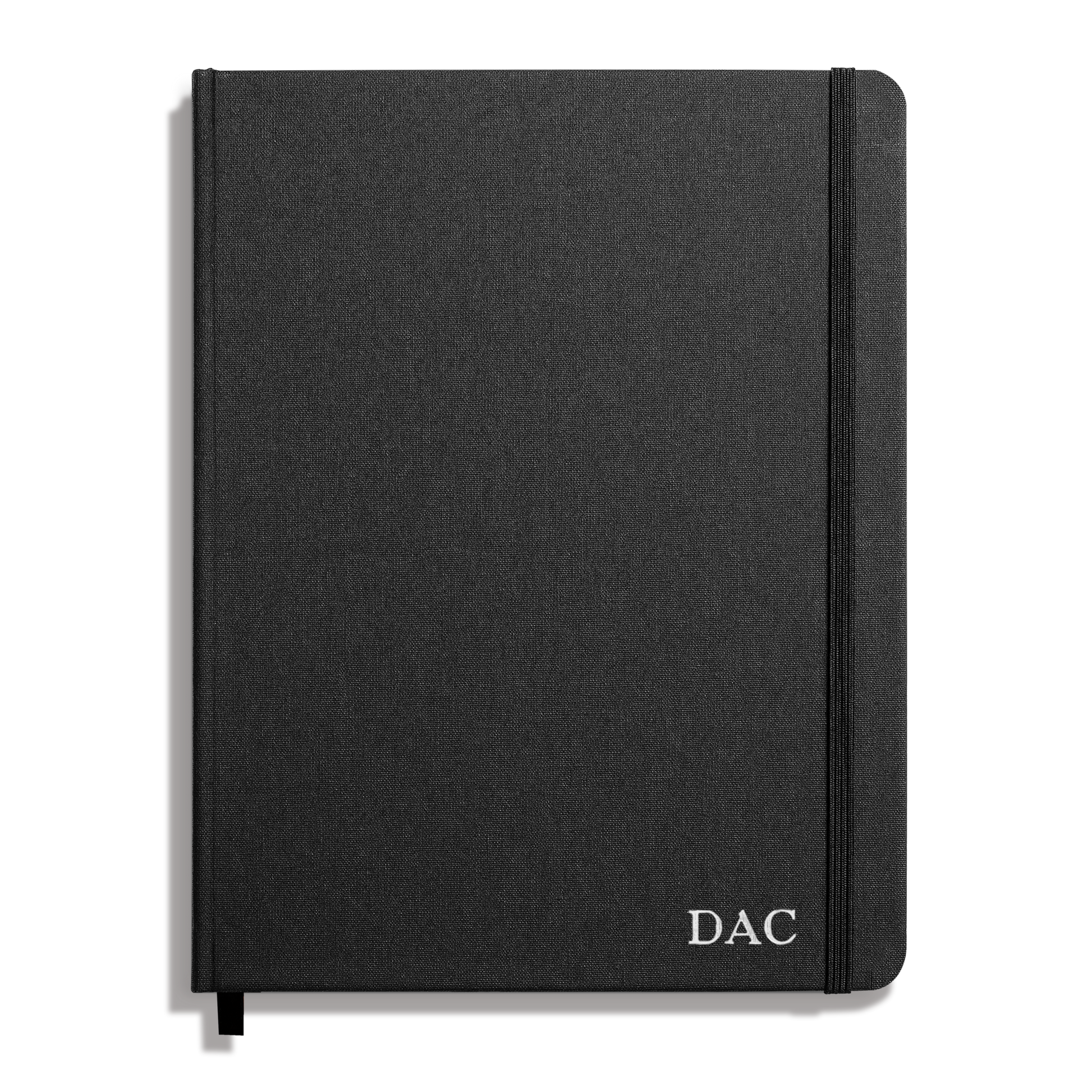 The Shinola Large Hard Plain Journal in black features a durable linen cover, elastic band closure, DAC initials in white on the bottom right, and acid-free paper for long-lasting quality.