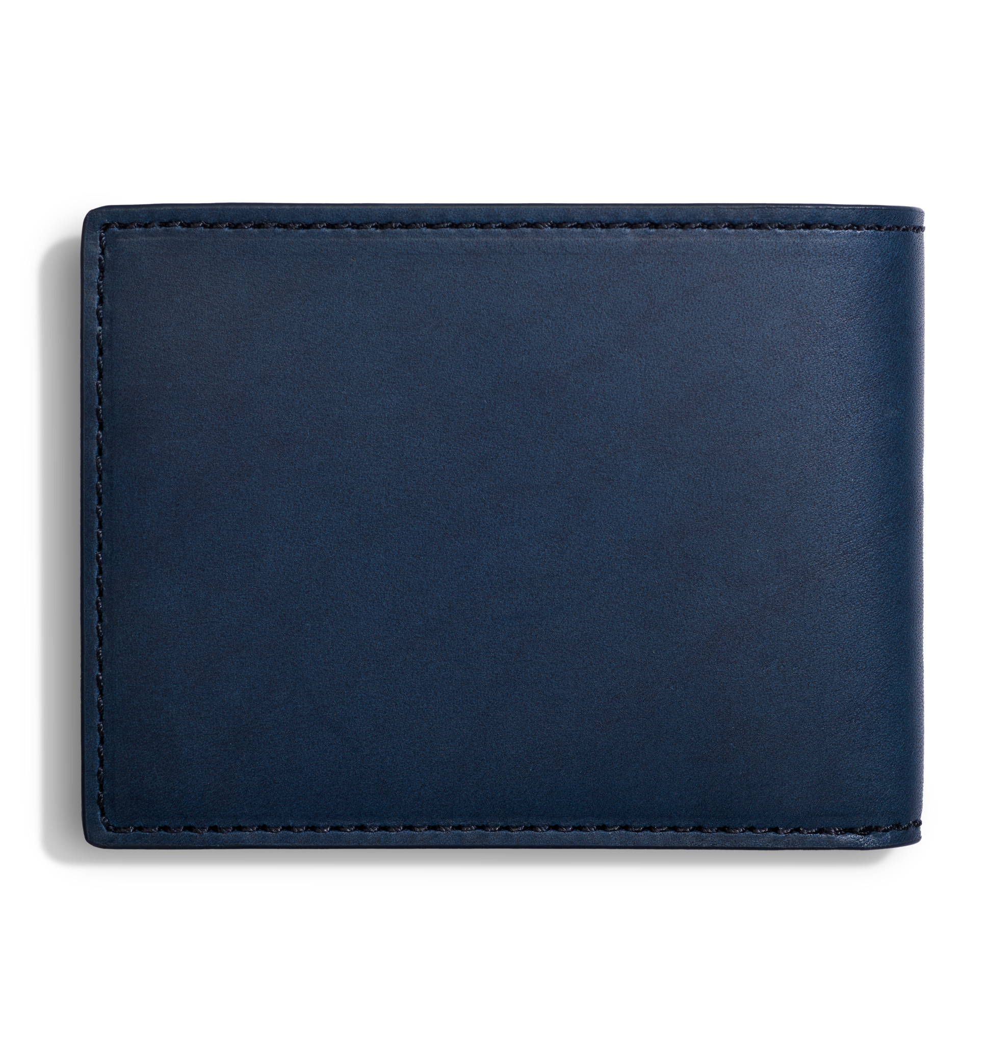 The Shinola Slim Bifold Wallet - Navy, crafted from leather and featuring visible edge stitching, is shown closed against a white background. This wallet combines style and convenience in a compact design.
