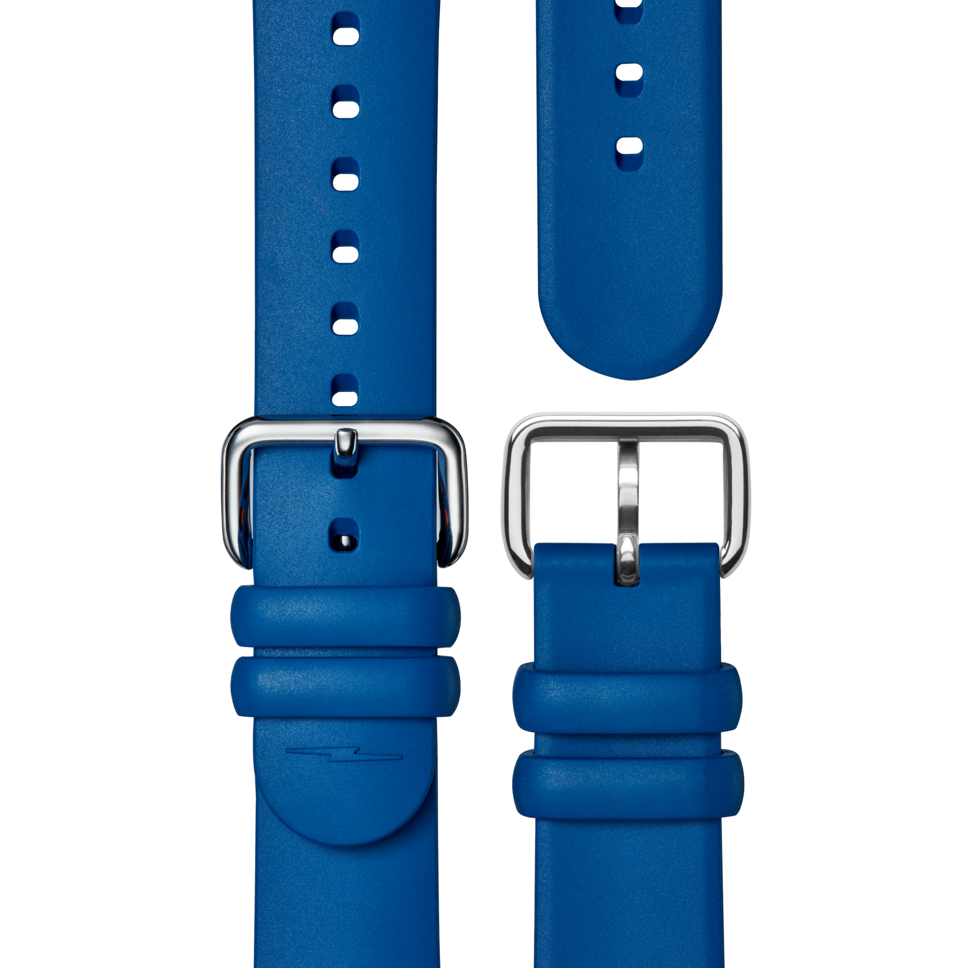 Two blue Shinola Detrola Watch straps with silver buckles are displayed on a white background. One strap has multiple adjustment holes; the other is plain. Both have rounded ends and smooth, modern surfaces inspired by art watches.