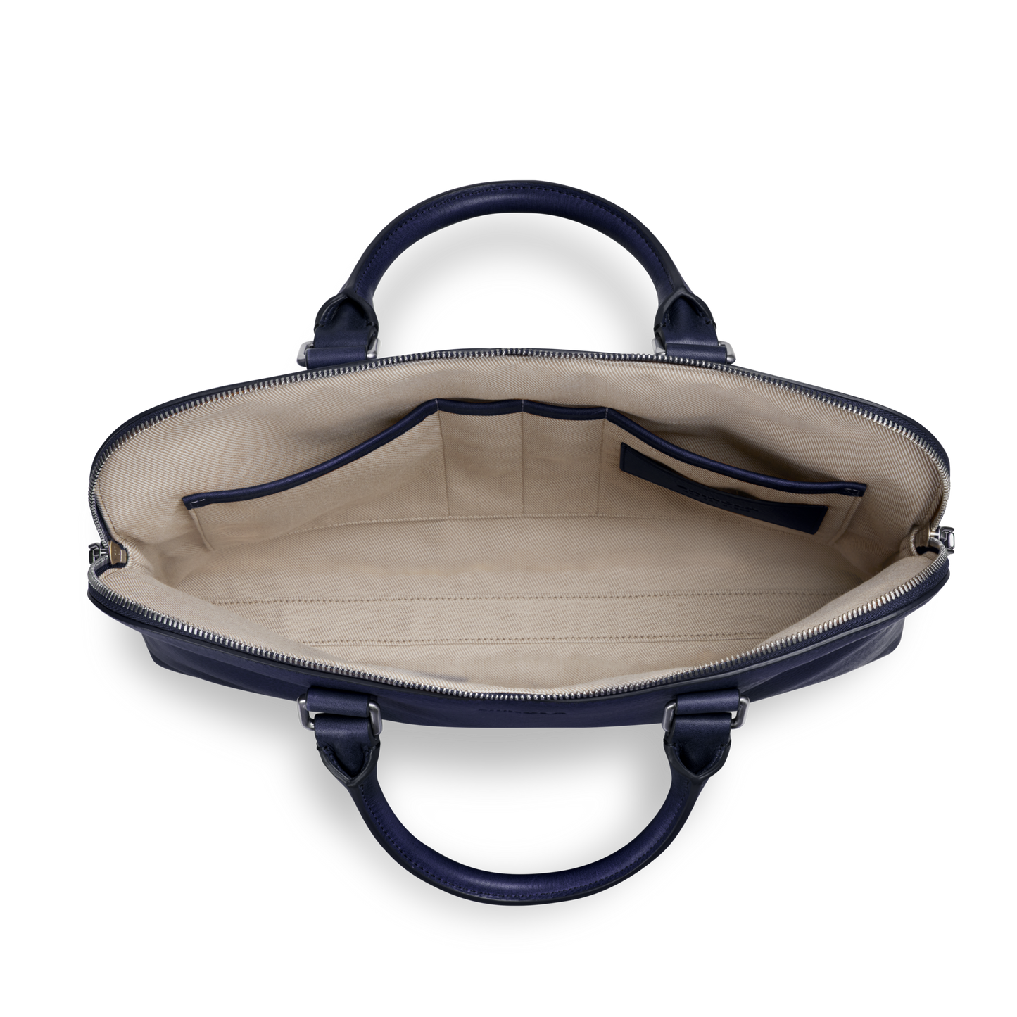 The Shinola Portfolio Briefcase - Lake is crafted from navy European grain leather and seen from above, reveals a beige fabric interior with multiple small pockets, a zippered compartment, and two rounded side handles for an elegant touch.