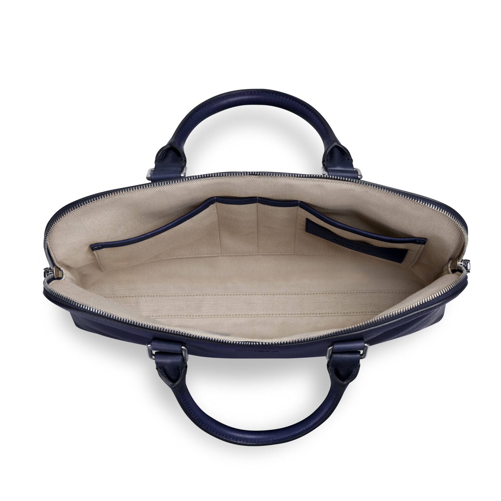 The Shinola Portfolio Briefcase - Lake is crafted from navy European grain leather and seen from above, reveals a beige fabric interior with multiple small pockets, a zippered compartment, and two rounded side handles for an elegant touch.