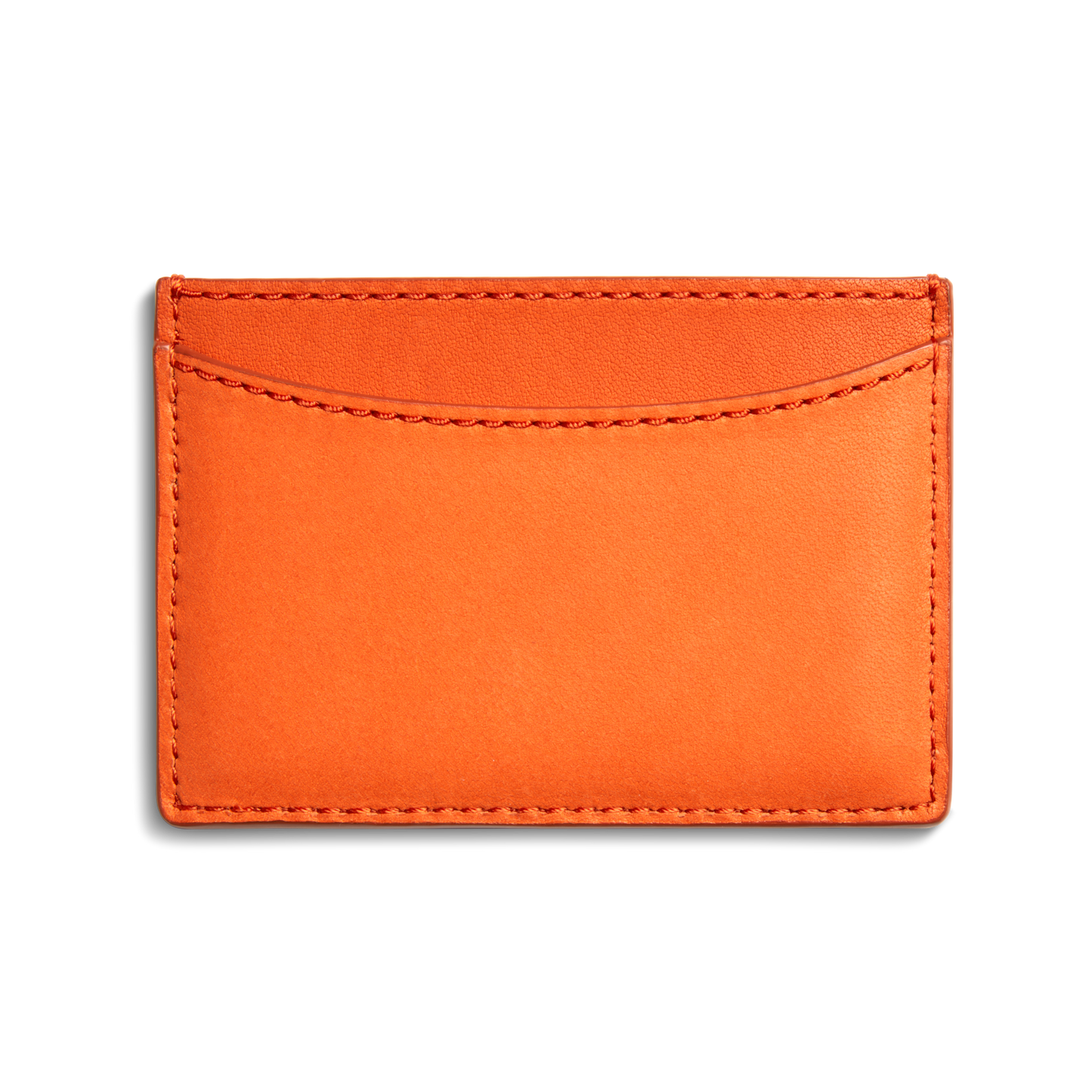The Shinola Leather 3 Pocket Card Case in Tangerine is a slim, rectangular orange leather holder with visible stitching and one curved front pocket, shown against a plain white background.