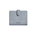 A closed Small Snap Wallet - Mist by Shinola, featuring a light blue color and tab closure with the brand name embossed on the front, is shown against a plain white background.