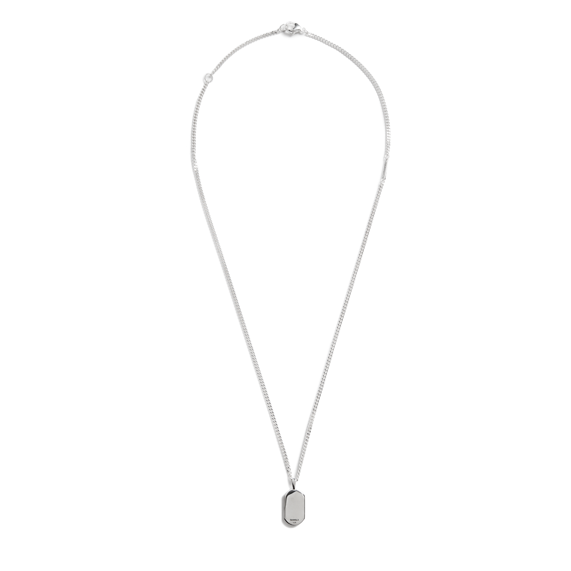 The Shinola Black Diamond Pave Tag Necklace features a thin adjustable curb chain and a small rectangular pendant, displayed on a white background.