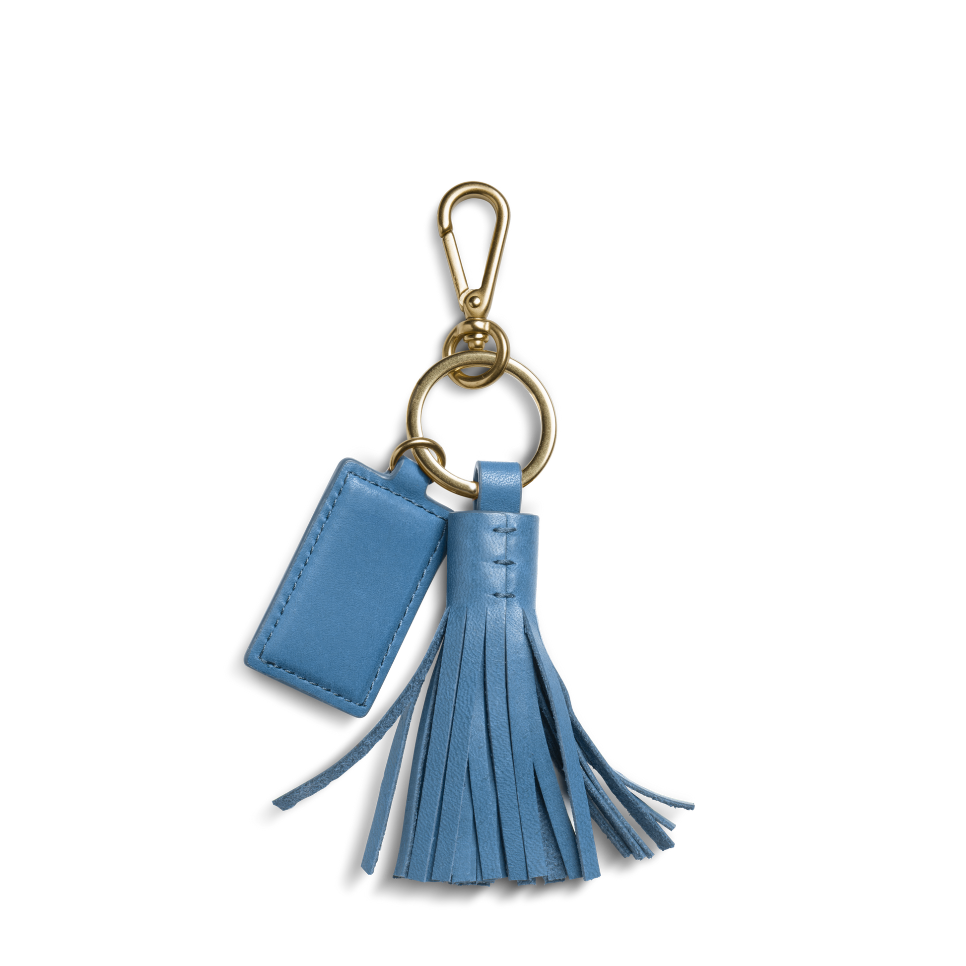 The Shinola Leather Tassel Keychain - River features blue leather, a gold clasp and ring, a blue rectangular tag, and a matching tassel—an elegant monogram keychain shown on a white background.